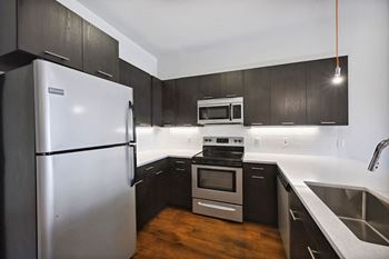 Fully furnished kitchen with stainless steel appliances